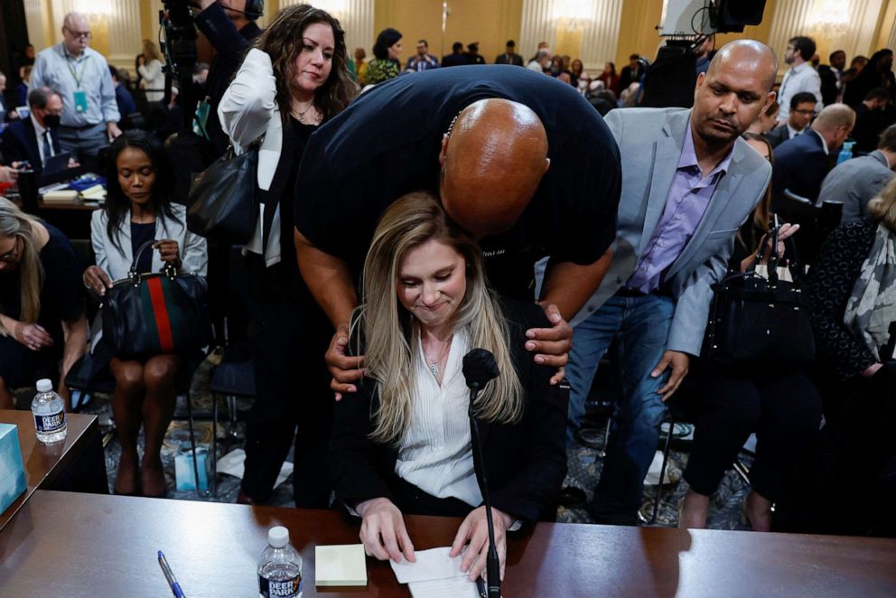 PHOTO: U.S. Capitol Police Officer Pfc. Harry Dunn embraces U.S. Capitol Police Officer Caroline Edwards after her testimony during the hearing of the U.S. House Select Committee to Investigate the January 6 Attack, in Washington, D.C., June 9, 2022.