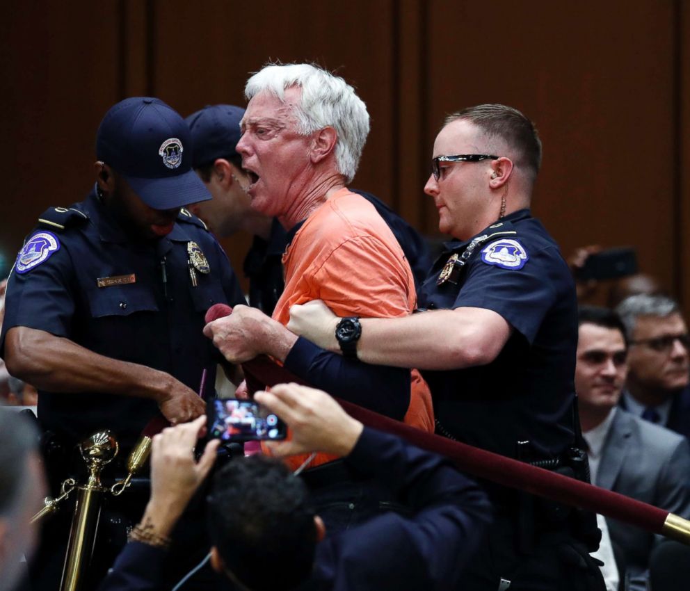 PHOTO: A protestor is removed from the Senate Intelligence Committee hearing room before the start of the confirmation hearing for CIA nominee Gina Haspel, May 9, 2018 on Capitol Hill in Washington.