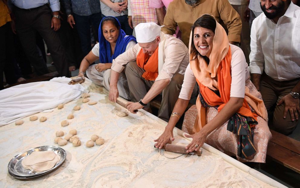 PHOTO: Ambassador to the United Nations Nikki Haley makes Indian bread in the kitchen of the Sis Ganj Gurudwara, a Sikh temple, in New Delhi, June 28, 2018.