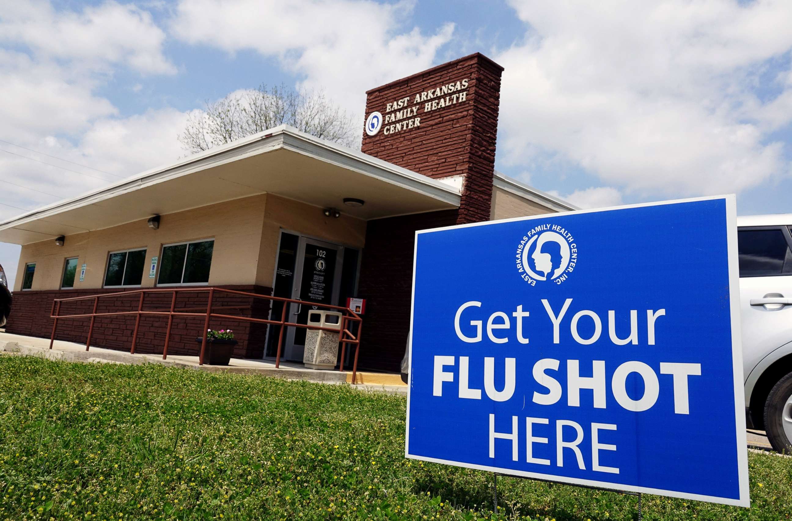 PHOTO: A sign reads "Get your flu shots here" outside of the East Arkansas Family Health Center in Lepanto, Ark., May 2, 2018.