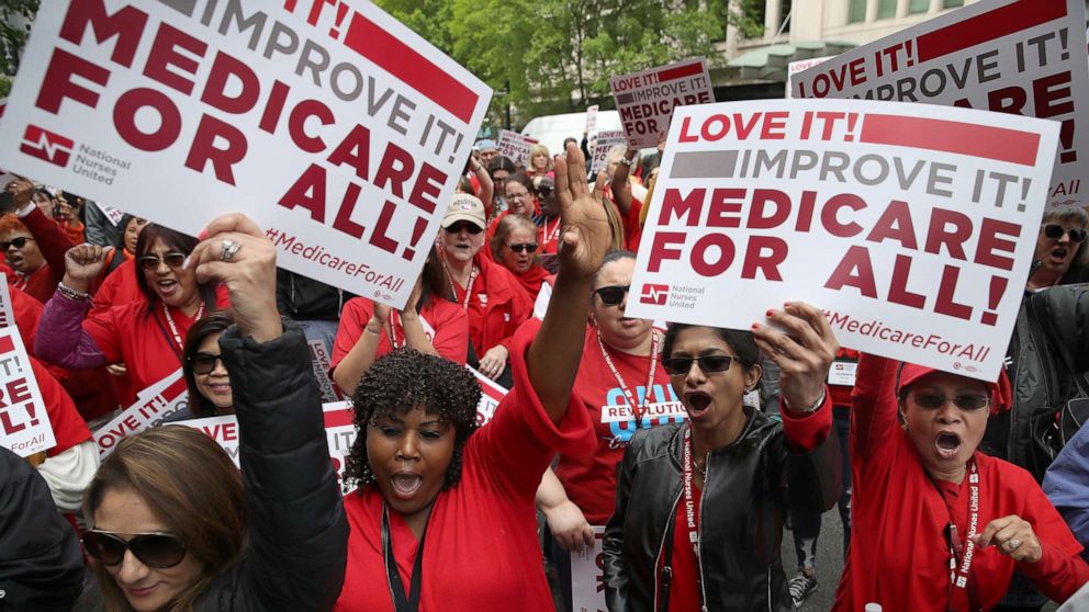 PHOTO: Protesters supporting Medicare for All hold a rally outside PhRMA headquarters April 29, 2019 in Washington, D.C.