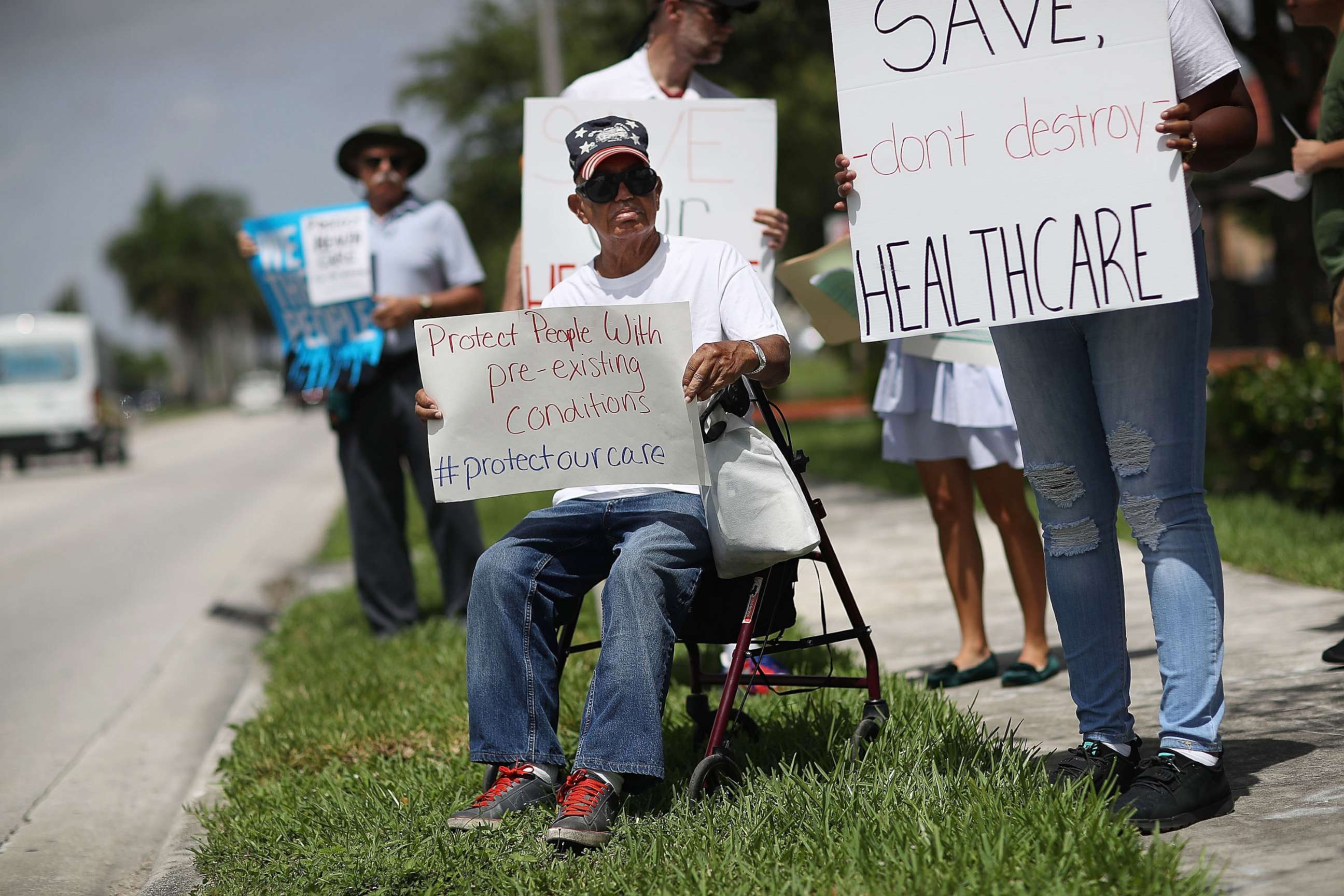 PHOTO: People protest in Miami, Fla., Aug. 3, 2017, against cuts to Medicaid and the Affordable Care Act.