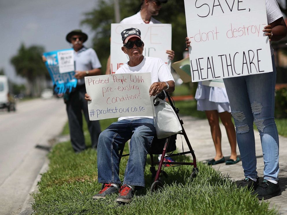 PHOTO: People protest in Miami, Fla., Aug. 3, 2017, against cuts to Medicaid and the Affordable Care Act.