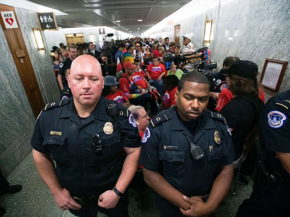 PHOTO: Capitol Police maintain order as hundreds of people, many with disabilities, arrive for a Senate Finance Committee hearing on the last-ditch GOP push to overhaul the nations health care system, on Capitol Hill in Washington, Sept. 25, 2017.
