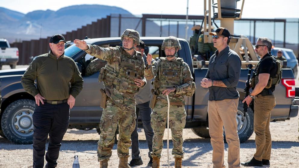 PHOTO: Defense Secretary Pete Hegseth, second from right, and Border czar Tom Homan, left, listen to a briefing by Army soldiers while visiting the US-Mexico border in Sunland Park,, N.M., Feb. 3, 2025.