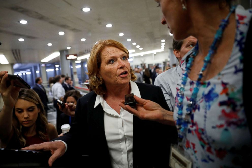 PHOTO: Sen. Heidi Heitkamp speaks with reporters ahead of the weekly policy luncheons on Capitol Hill in Washington, July 24, 2018.