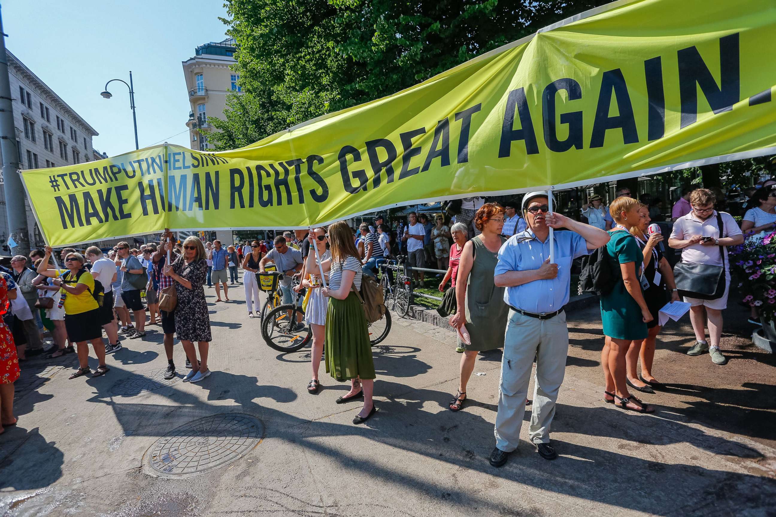 PHOTO: People take part in a demonstration calling for human rights and democracy in Helsinki, Finland, July 16, 2018, on the day of the summit between President Donald Trump and Russian President Vladimir Putin.