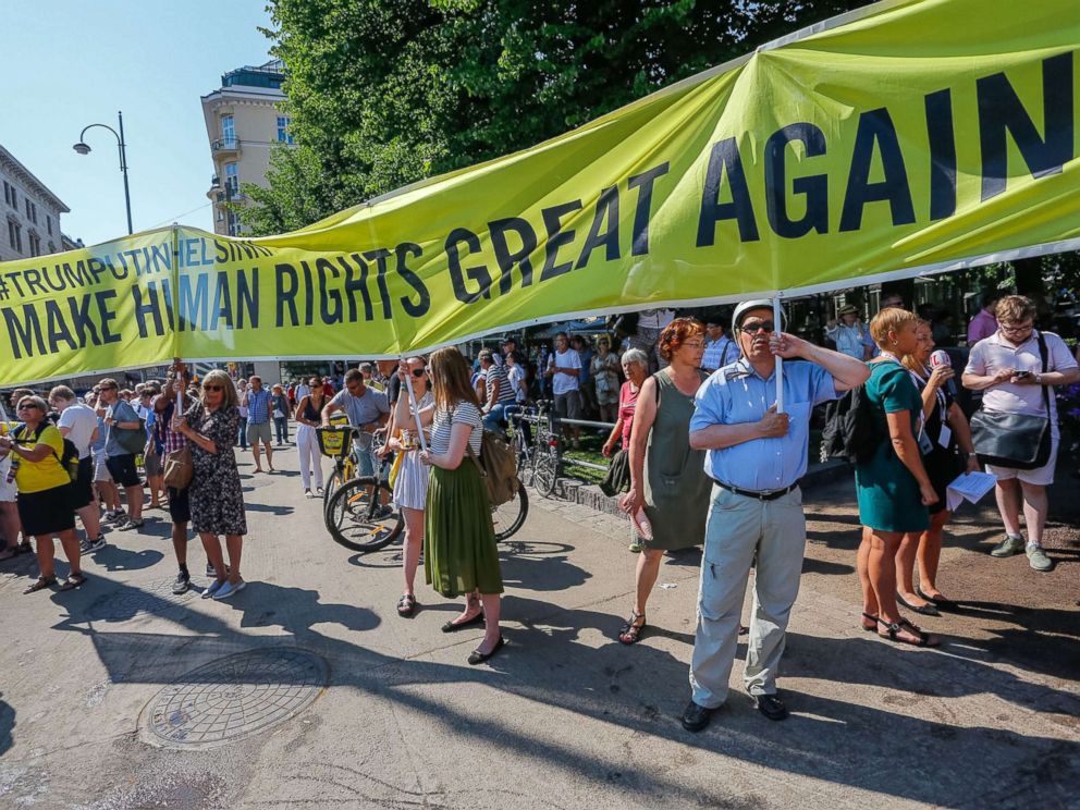 PHOTO: People take part in a demonstration calling for human rights and democracy in Helsinki, Finland, July 16, 2018, on the day of the summit between President Donald Trump and Russian President Vladimir Putin.