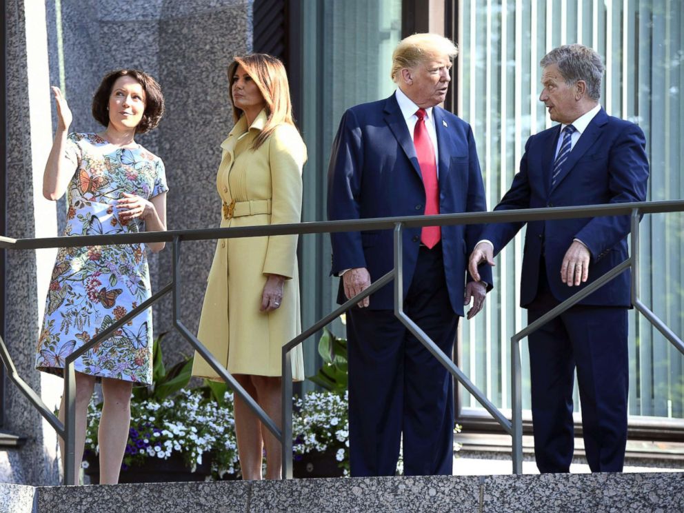 PHOTO: President Donald Trump talks with the President of Finland Sauli Niinisto (right), as first lady Melania Trump talks with his spouse Jenni Haukio, left, at the presidents official residence in Mantyniemi, in Helsinki, Finland, July 16, 2018.