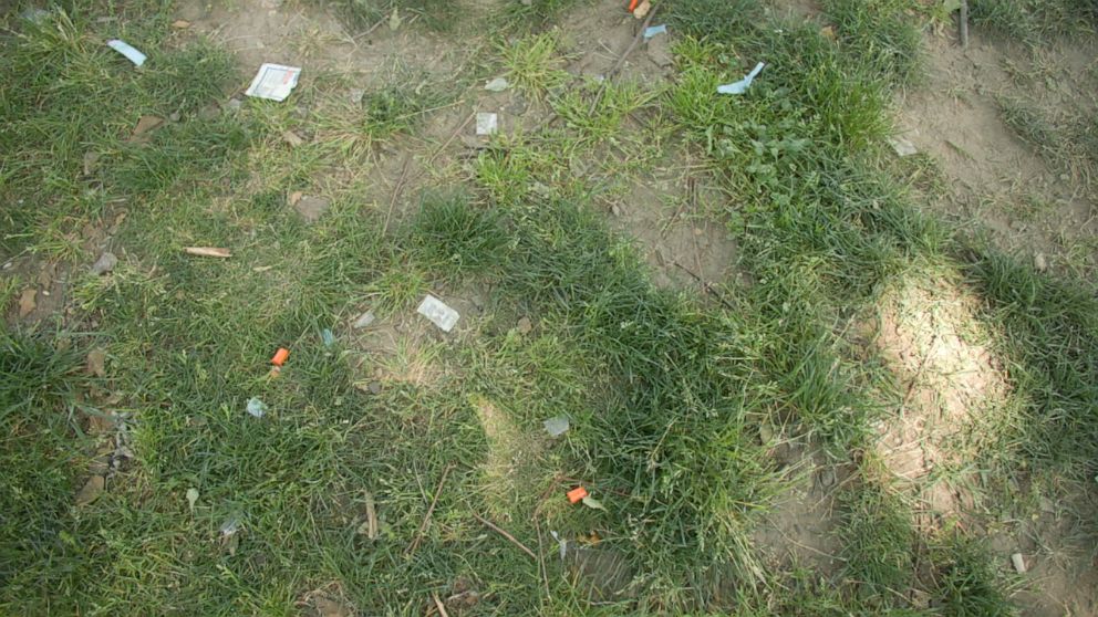 PHOTO: McPherson Square park in the Kensington neighborhood of Philadelphia is littered with wrappers and orange caps from syringes left behind by drug users.