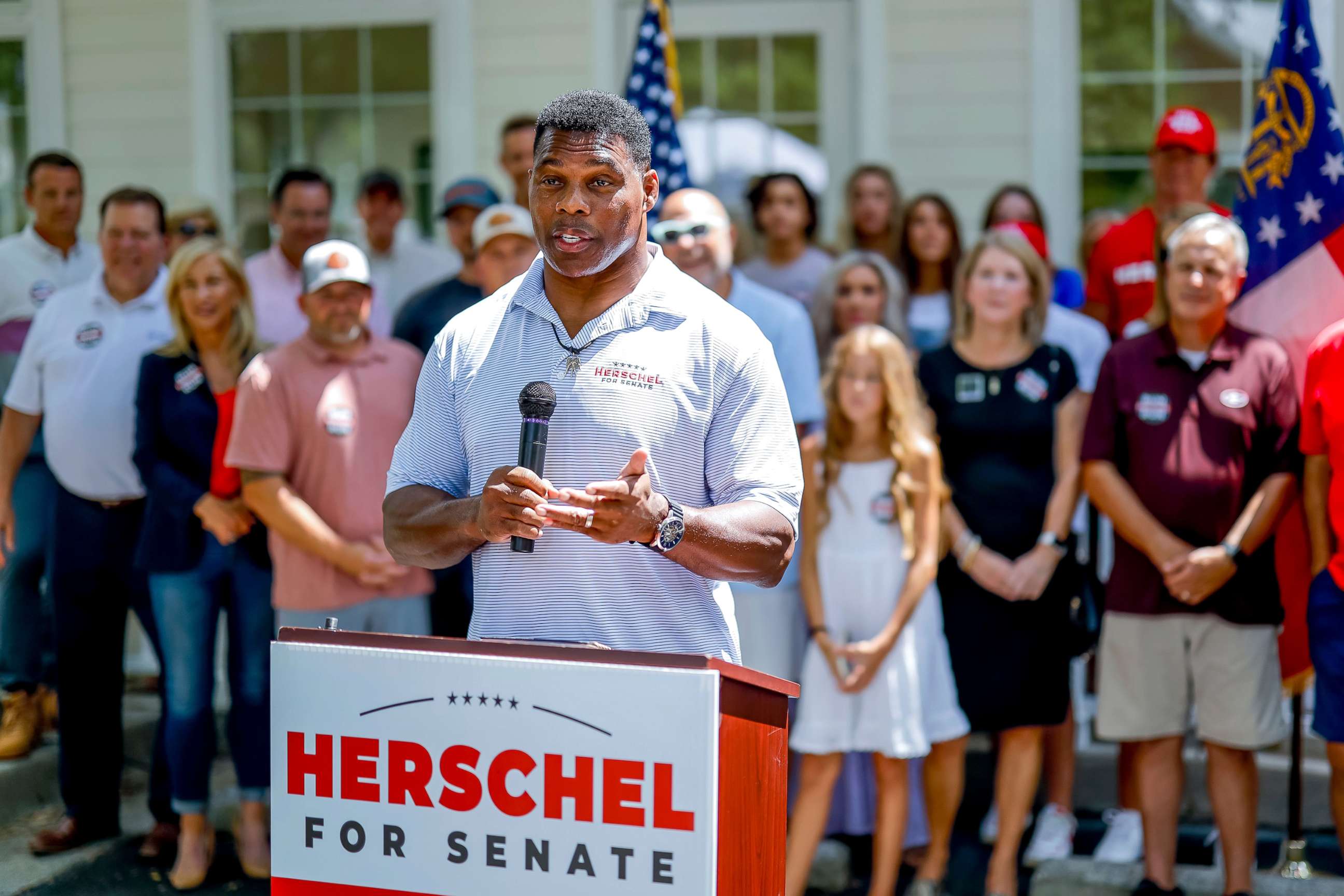 PHOTO: Georgia Republican Senate candidate Herschel Walker participates in a campaign event to announce his opposition to the Democrats' proposed Inflation Reduction Act, in Milton, Ga., Aug. 4, 2022.