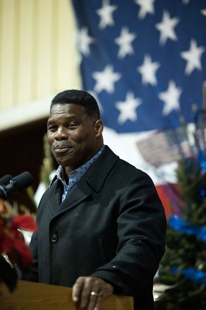 PHOTO: Republican Senate candidate Herschel Walker addresses a crowd gathered for a rally with prominent Republicans on November 21, 2022 in Milton, Georgia.
