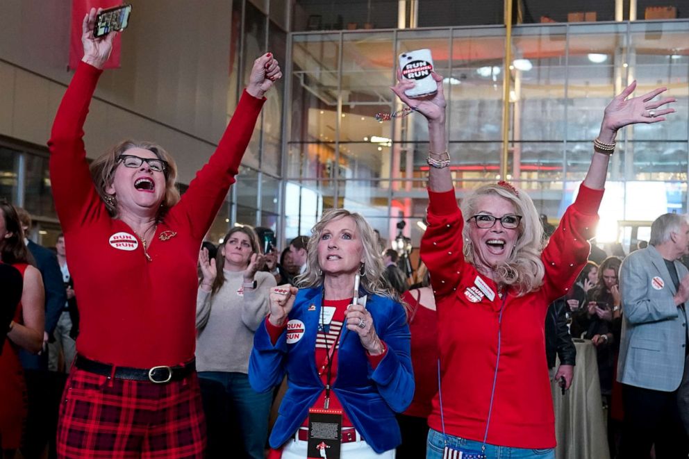 PHOTO: Supporters cheer during an election night watch party for Republican candidate Herschel Walker, on Dec. 6, 2022, in Atlanta.