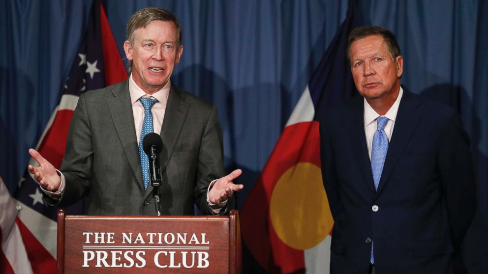 PHOTO: Colorado Gov. John Hickenlooper, left, joined by Ohio Gov. John Kasich, speaks during a news conference at the National Press Club in Washington, June 27, 2017. 