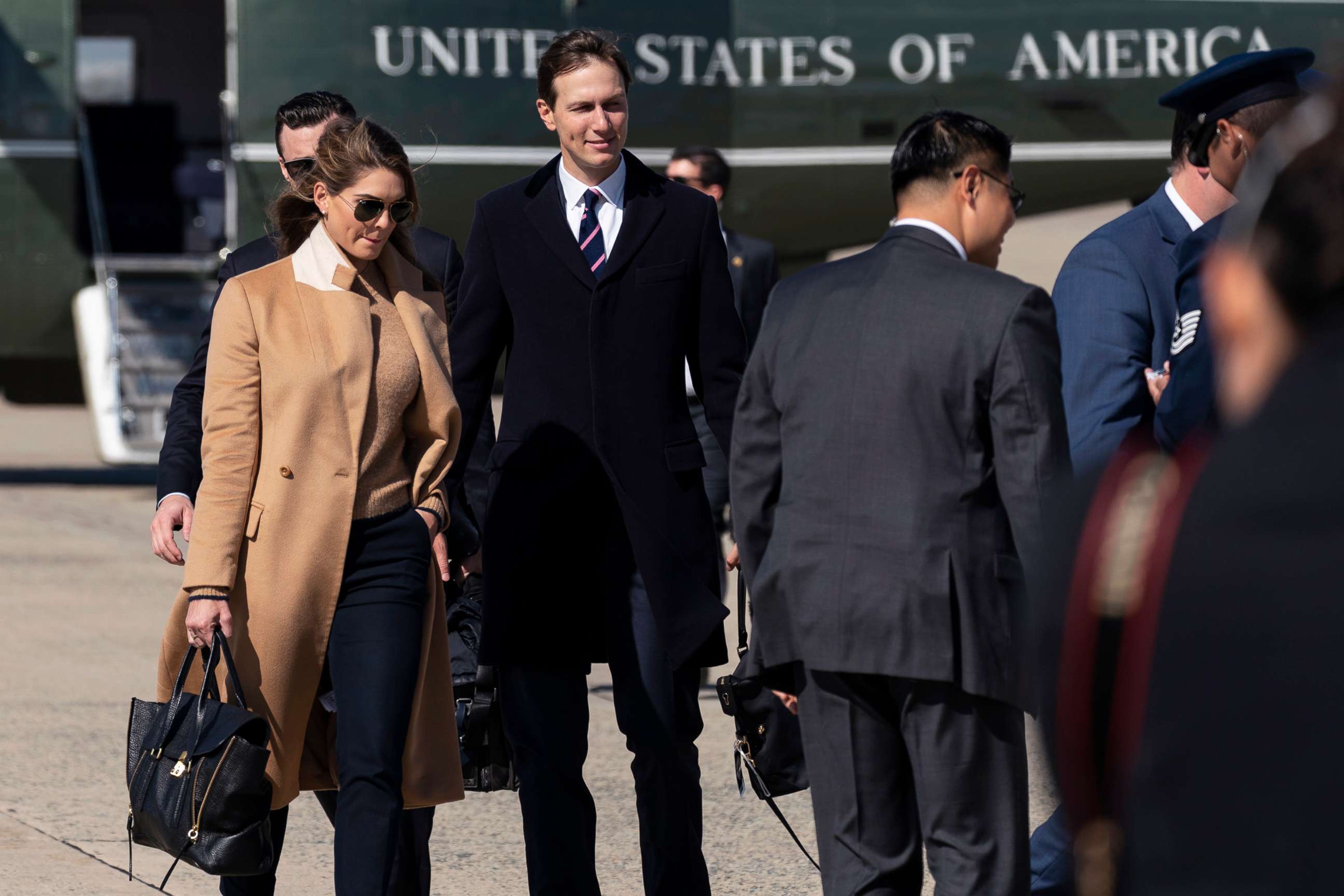 PHOTO: Counselor to the President Hope Hicks, left, with White House senior adviser Jared Kushner, walk from Marine One to accompany President Donald Trump aboard Air Force One as he departs, Sept. 30, 2020, at Andrews Air Force Base, Md.
