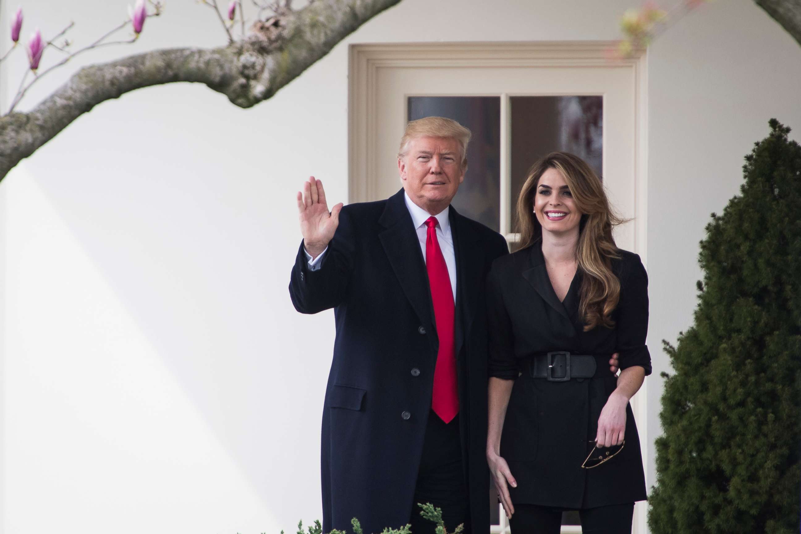 PHOTO: President Donald J. Trump waves to the press beside White House Communications Director Hope Hicks as he walks from the Oval Office of the White House to board Marine One, March 29, 2018.