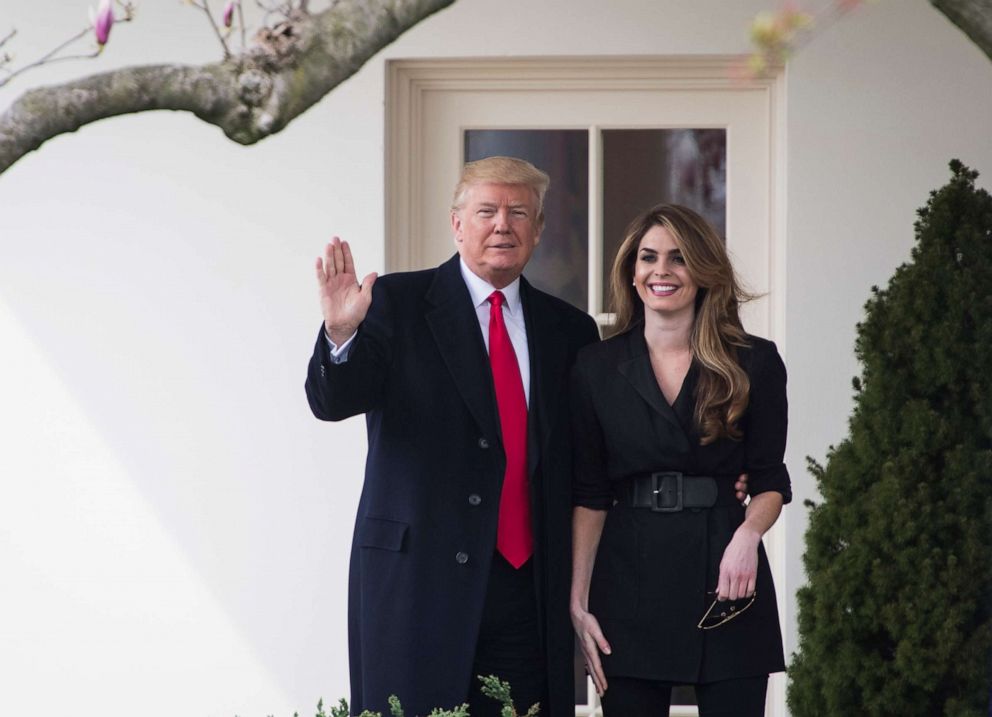 PHOTO: President Donald J. Trump waves to the press beside White House Communications Director Hope Hicks as he walks from the Oval Office of the White House to board Marine One, March 29, 2018.