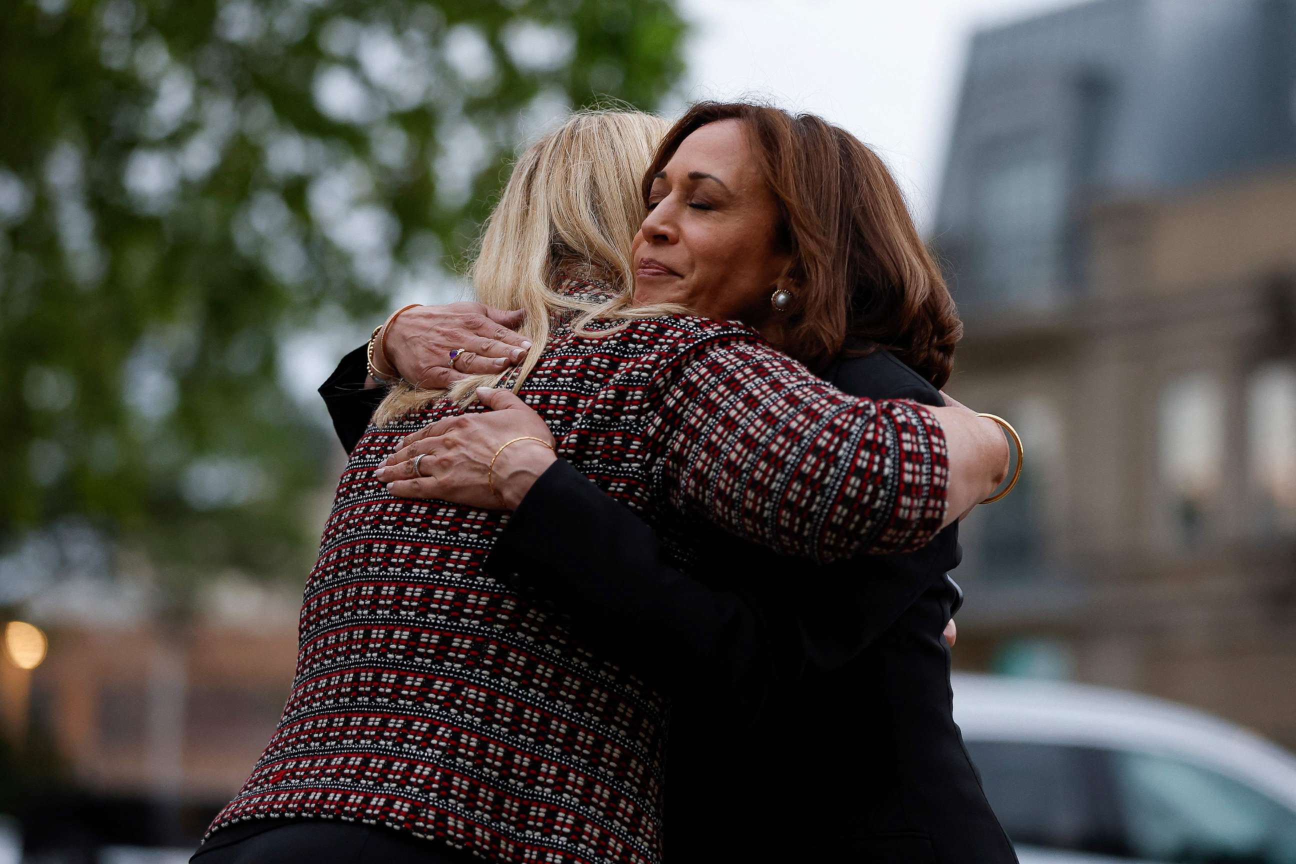 PHOTO: Vice President Kamala Harris hugs Highland Park Mayor Nancy Rotering as she makes a visit to the site of a mass shooting in Highland Park, Ill., July 5, 2022. 