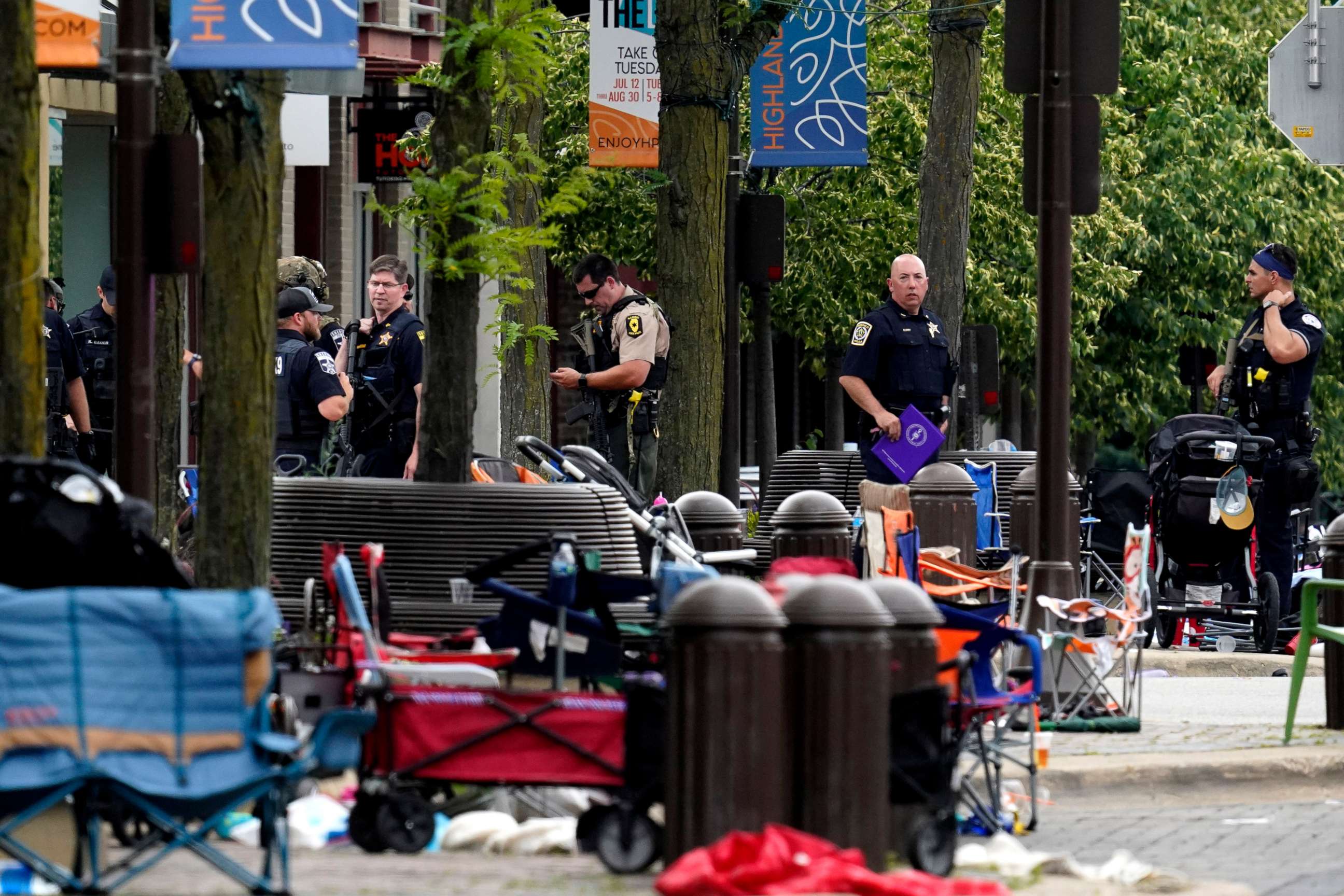 PHOTO: Law enforcement search after a mass shooting at the Highland Park Fourth of July parade in downtown Highland Park, Ill., on Monday, July 4, 2022. 