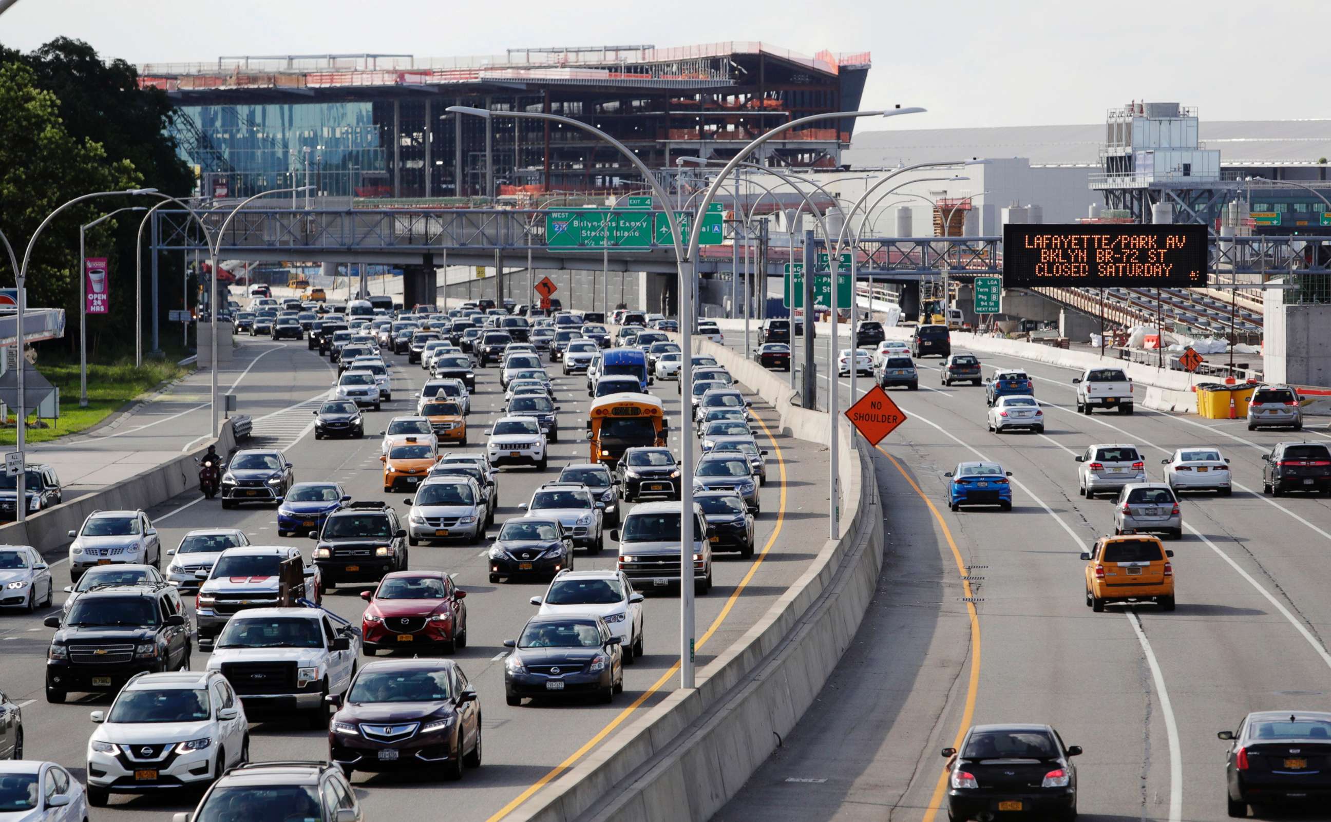 PHOTO: Cars on the Grand Central Parkway pass LaGuardia Airport in New York, Aug. 1, 2018. The Trump administration has proposed rolling back tougher Obama-era gas mileage requirements that are set to take effect after 2020.