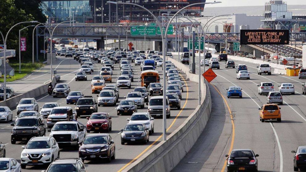 PHOTO: Cars on the Grand Central Parkway pass LaGuardia Airport in New York, Aug. 1, 2018. The Trump administration has proposed rolling back tougher Obama-era gas mileage requirements that are set to take effect after 2020.