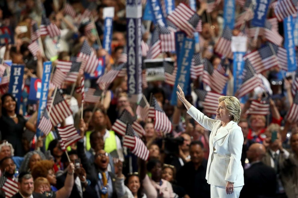 PHOTO: Former Secretary of State Hillary Clinton acknowledges the crowd as she arrives on stage during the fourth day of the Democratic National Convention at the Wells Fargo Center, July 28, 2016 in Philadelphia.