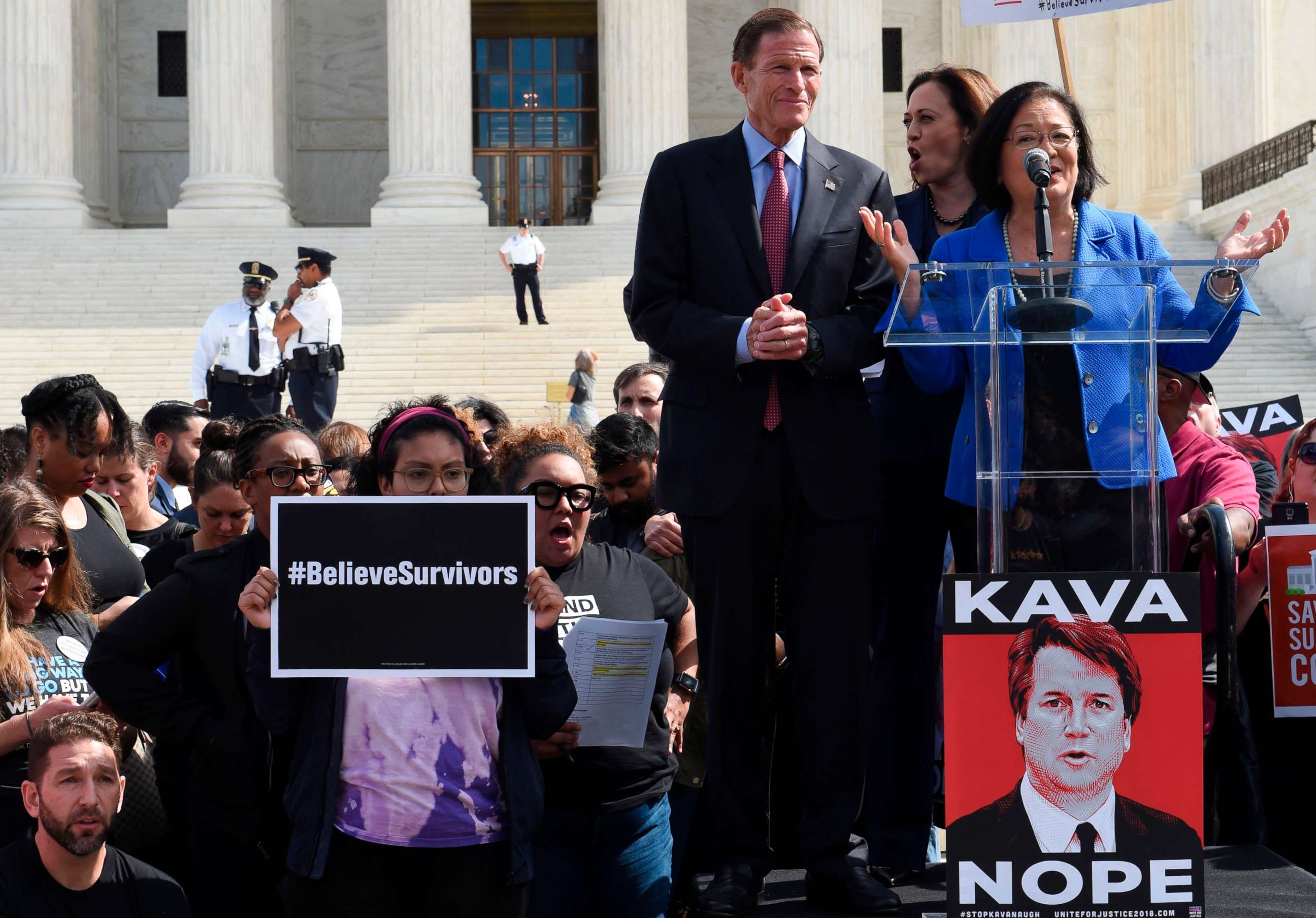 PHOTO: Democratic Senator Mazie Hirono address protesters against Brett Kavanaugh's Supreme Court nomination with Senators Richard Blumenthal and Kamala Harris at her side on the steps of the Supreme Court in Washington, Sept. 28, 2018. 
