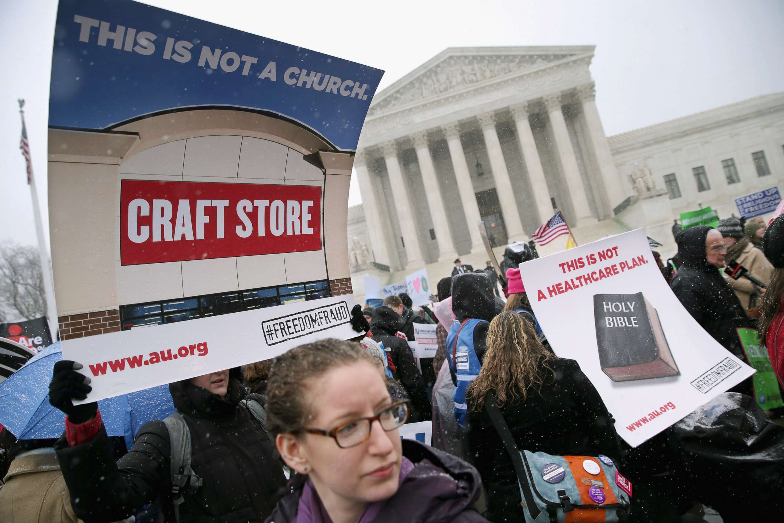 PHOTO: Demonstrators rally outside of the Supreme Court during oral arguments in Sebelius v. Hobby Lobby, March 25, 2014, in Washington, D.C. 