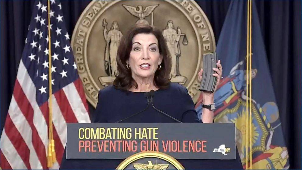 PHOTO: In this image taken from video, New York Gov. Kathy Hochul shows an extended rifle magazine during a news conference, Wednesday, May 18, 2022, in New York.