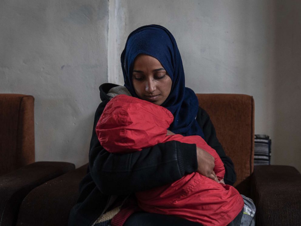 PHOTO: Hoda Muthana, who was born in the United States and joined the Islamic State four years ago, with her son at a detention camp in Al-Hawl, Syria, Feb. 17, 2019.