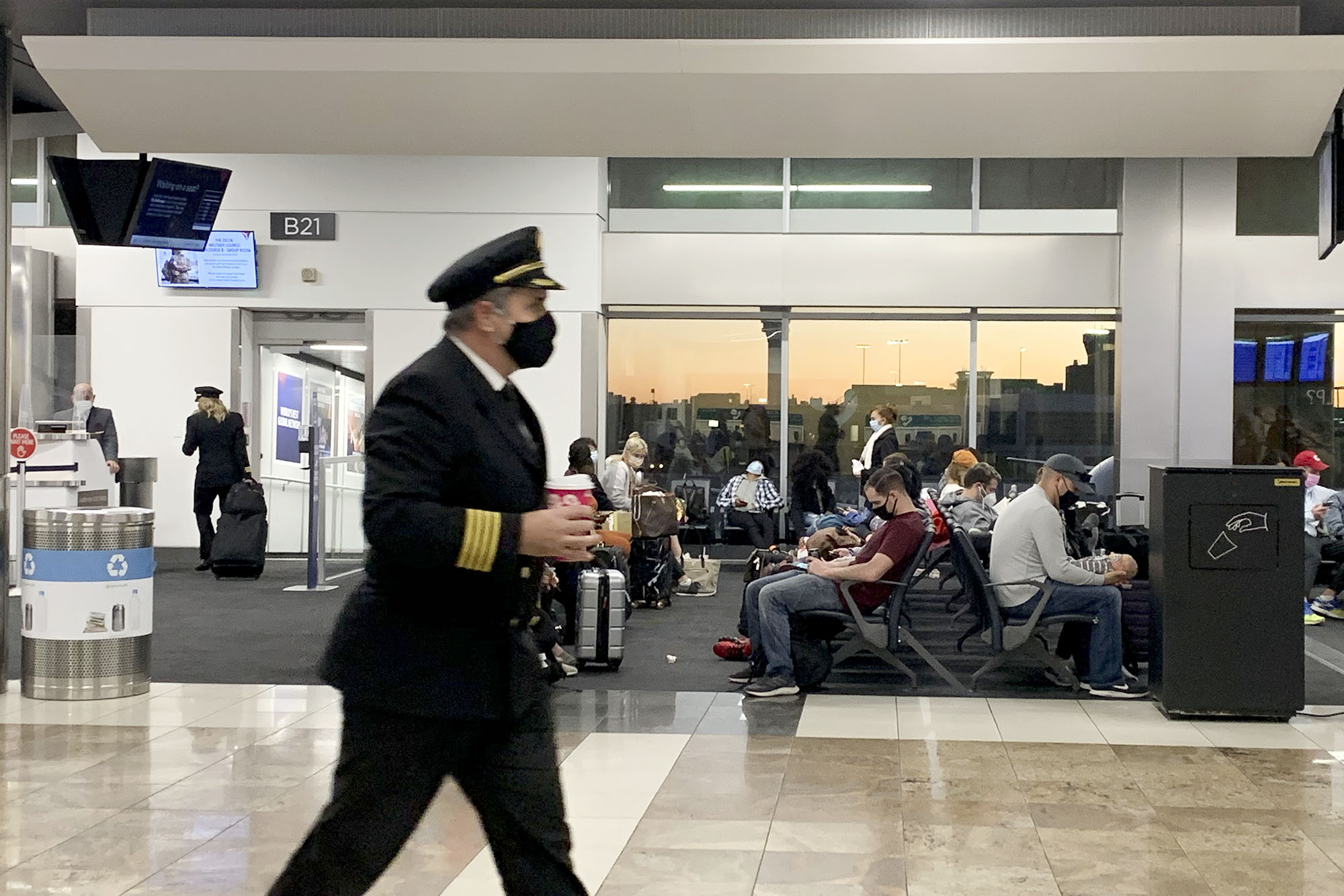 PHOTO: A flight crew member walks through a Delta terminal at Hartsfield-Jackson International Airport in Atlanta, Dec. 22, 2020.