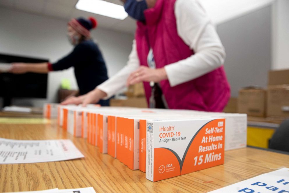 PHOTO: Free Covid-19 at-home antigen rapid tests are distributed to members of the public at a library in Silver Spring, Maryland, Jan. 14, 2022.