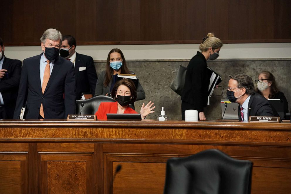 PHOTO: Senators Roy Blunt, Amy Klobuchar and Gary Peters are seen prior to a Senate Homeland Security and Governmental Affairs & Senate Rules and Administration joint hearing to discuss the January 6th attack on the U.S. Capitol, March 3, 2021.