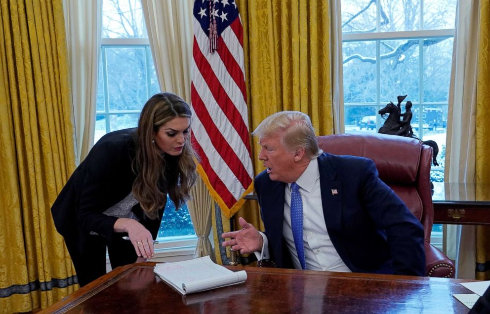 PHOTO: President Donald Trump confers with White House Communications Director Hope Hicks during an interview with Reuters at the White House, Jan. 17, 2018. 