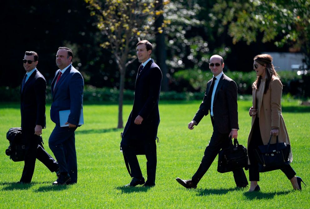 PHOTO: Hope Hicks, far right, is seen walking to Marine One on the White House's South Lawn, Sept. 30, 2020, with fellow presidential aides, left to right, Nicholas Luna, Dan Scavino, Jared Kushner and Stephen Miller.