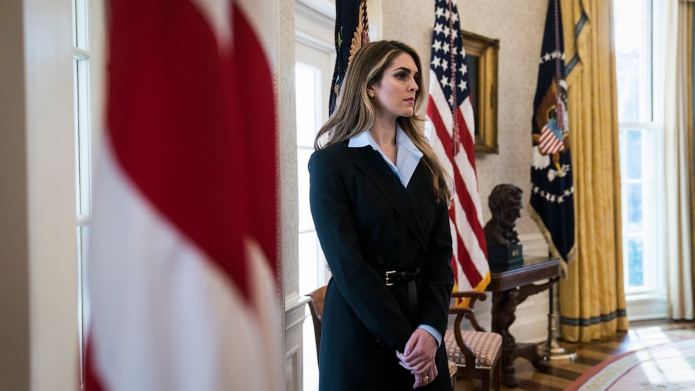 PHOTO: White House Communications Director Hope Hicks stand by as President Donald Trump speaks during a meeting in the Oval Office at the White House, Feb. 9, 2018.
