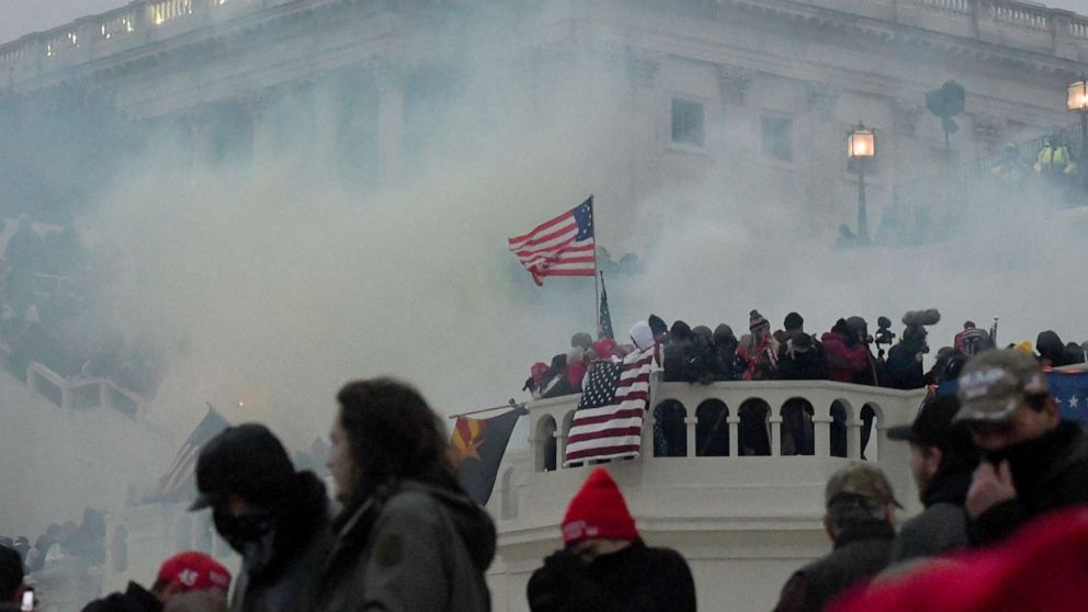 PHOTO: Police clear the U.S. Capitol Building with tear gas as supporters of President Donald Trump gather outside, in Washington, Jan. 6, 2021.
