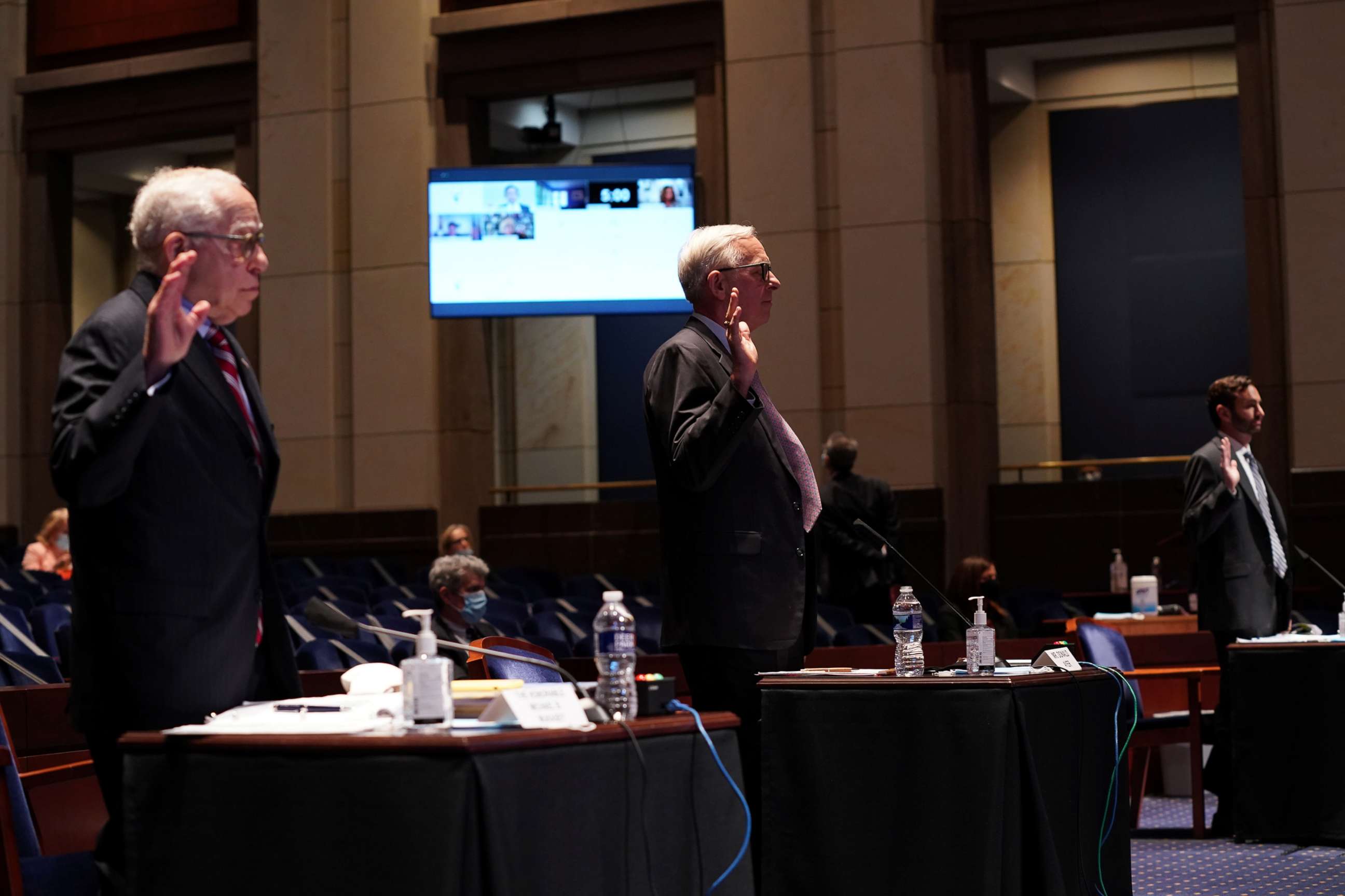 PHOTO: Michael B. Mukasey, Donald Ayer and John W. Elias swear in at the U.S. House Judiciary Committee meeting in Washington, June 24, 2020.