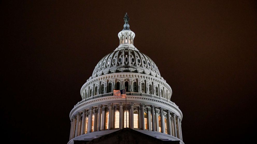 Congress narrowly averted financial calamity Tuesday by passing legislation that would raise the federal borrowing limit by $2.5 trillion.