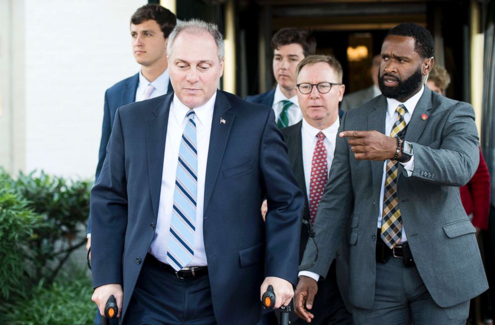 PHOTO: House Majority Whip Steve Scalise, left, leaves the House Republican Conference meeting at the Capitol Hill Club in Washington, June 13, 2018.