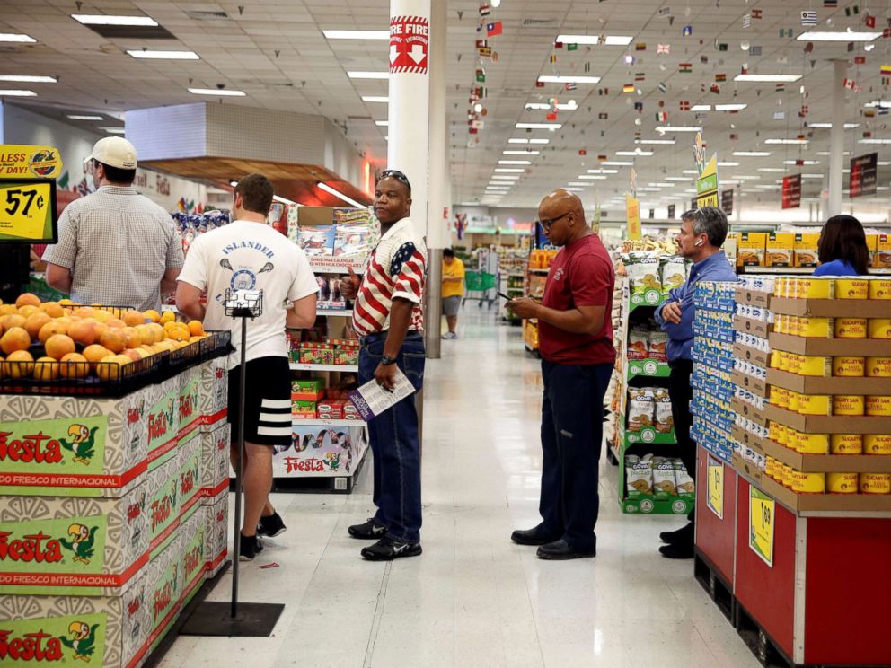 PHOTO: People queue to vote in the midterm elections in a supermarket in Houston, Texas, Nov. 6, 2018.