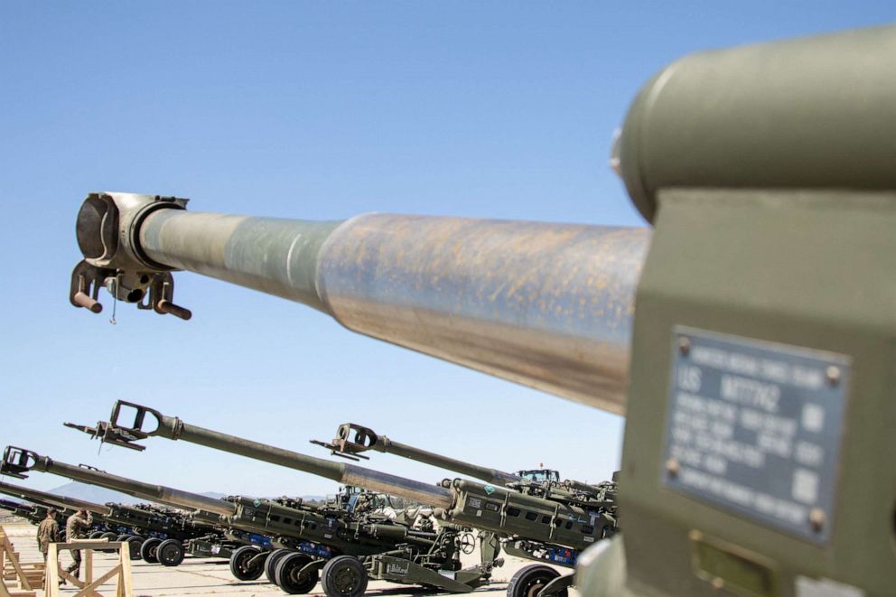 PHOTO: U.S. Marine Corps M777 towed 155 mm howitzers are staged on the flight line prior to being loaded onto a U.S. Air Force C-17 Globemaster III aircraft bound for Europe for delivery to Ukrainian forces, at March Air Reserve Base, April 22, 2022.