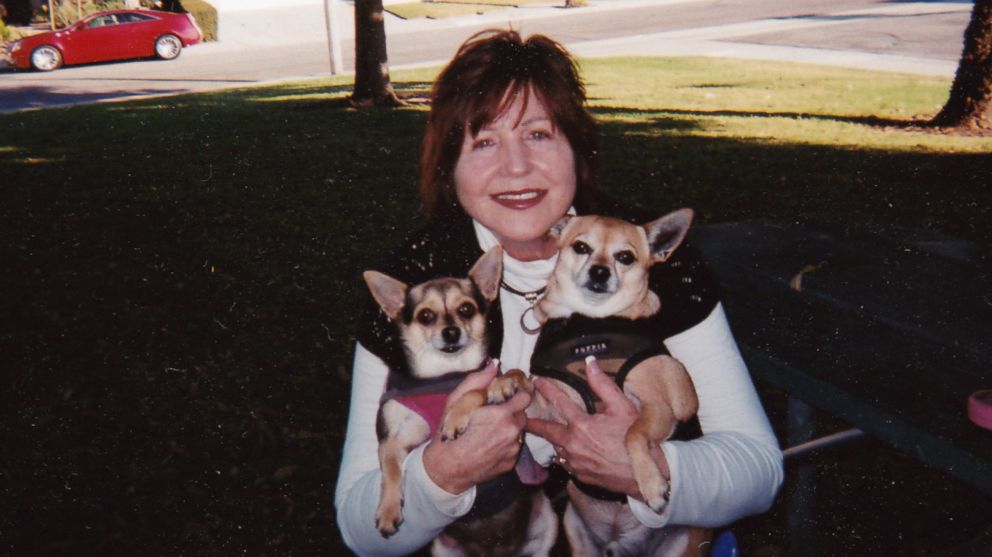 PHOTO: Marcy Shelton poses for a photo at home with her dogs in an undated handout photo.