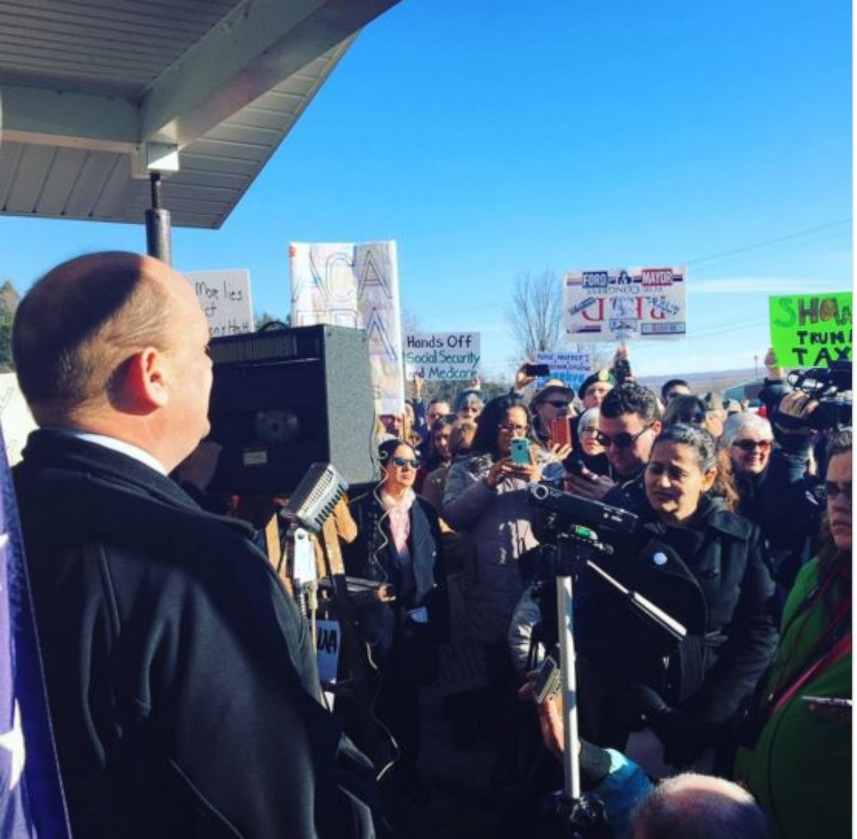 PHOTO: Rep. Tom Reed (D-NY) addresses a crowd outside of a town hall meeting, Feb. 17, 2017. 