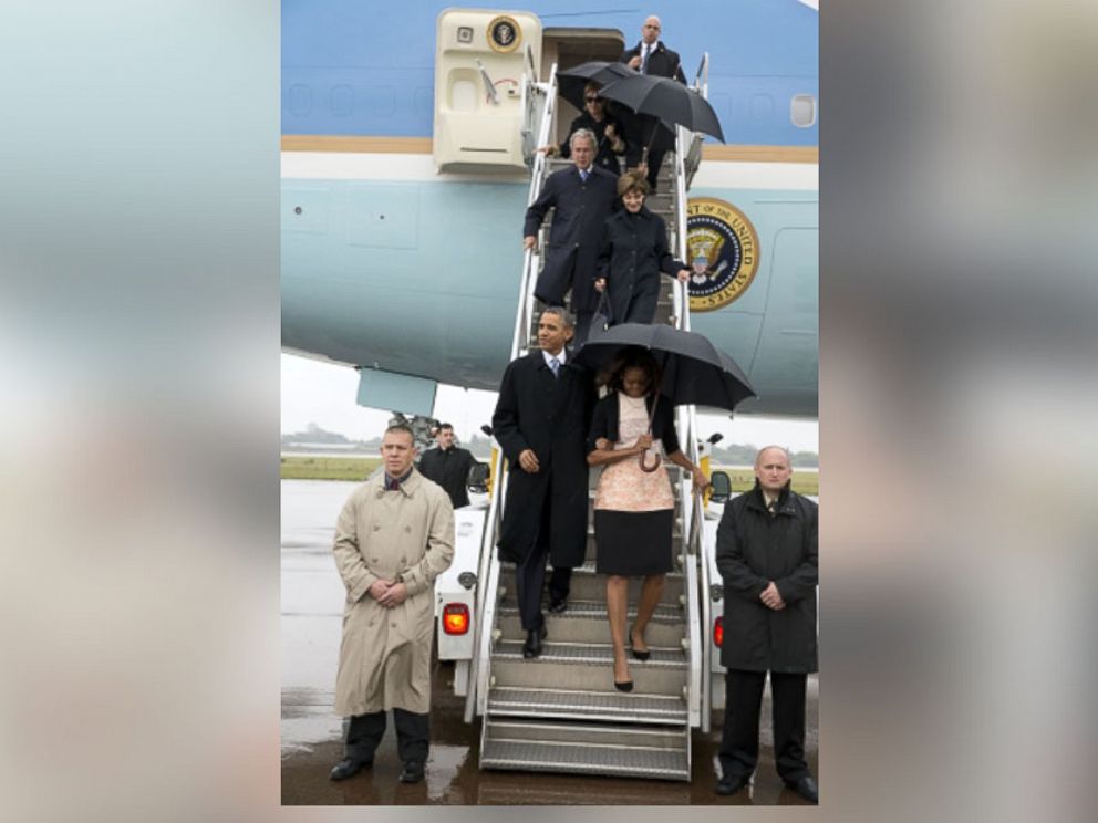 PHOTO: President and Mrs. Obama, former President and Mrs. Bush, and former Secretary of State Hillary Clinton arrive in South Africa, Dec. 10, 2013.