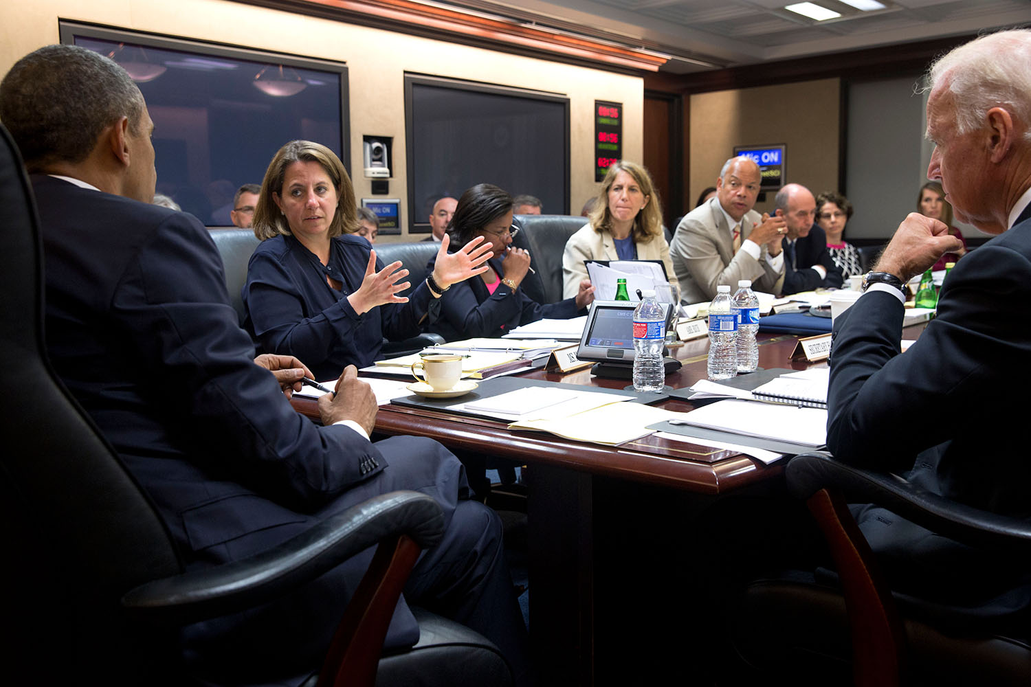 PHOTO: President Barack Obama and Vice President Joe Biden listen to Lisa Monaco during a Homeland Security Council meeting regarding immigration, in the Situation Room of the White House, July 21, 2014.