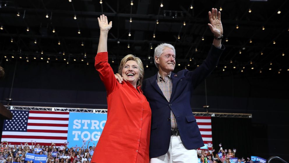 PITTSBURGH, PA - JULY 30:  Democratic presidential nominee former Secretary of State Hillary Clinton and her husband former U.S. president Bill Clinton greet supporters during a campaign rally with democratic vice presidential nominee U.S. Sen Tim Kaine (D-VA) at the David L. Lawrence Convention Center on July 30, 2016 in Pittsburgh, Pennsylvania. Hillary Clinton and Tim Kaine are continuing their three-day bus tour through Pennsylvania and Ohio. 