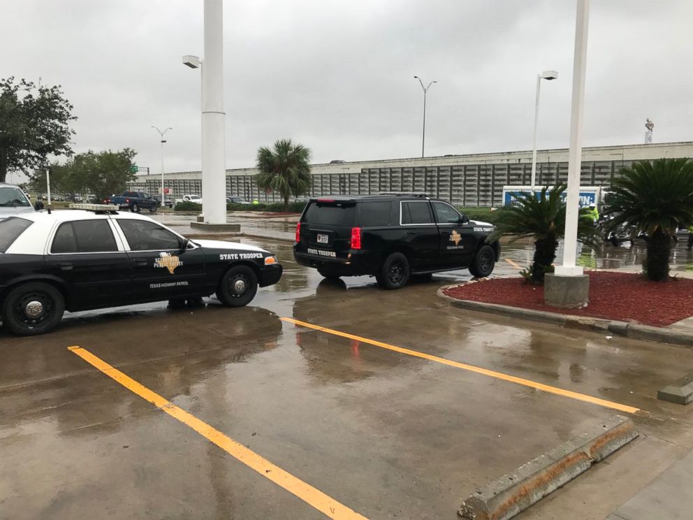 PHOTO: Police wait outside a Whataburger in Corpus Christi, Texas, on December 6, 2017, while first lady Melania Trump and second lady Karen Pence order inside.