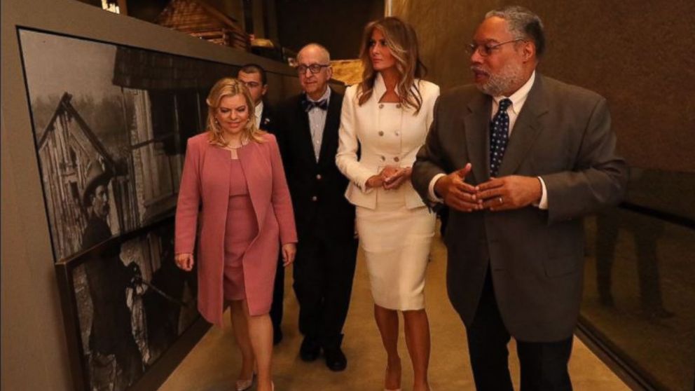 Melania Trump and Sara Netanyahu tour the Smithsonian's National Museum of African American History and Culture in Washington, Wednesday, Feb. 15, 2017, with Director Lonnie Bunch, second from right, and Smithsonian Secretary David Skorton. 