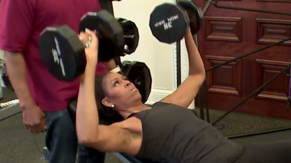 Michelle Obama exercises in a video published to YouTube on May 19, 2015 with the title, "#GimmeFive FLOTUS Style."